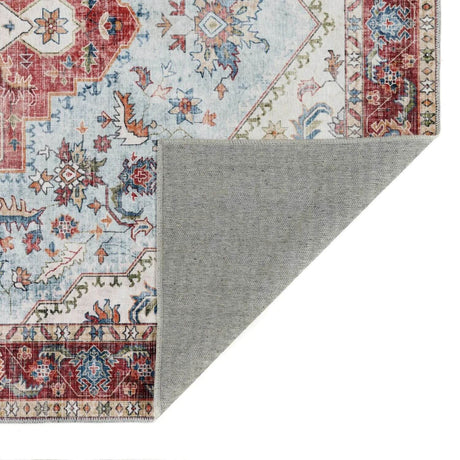 Elegant washable rug with intricate floral patterns in blue and red, perfect for adding style to any room