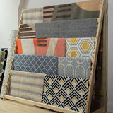 Display of various rugs including a White and Green Rug from Orsina showcasing modern designs