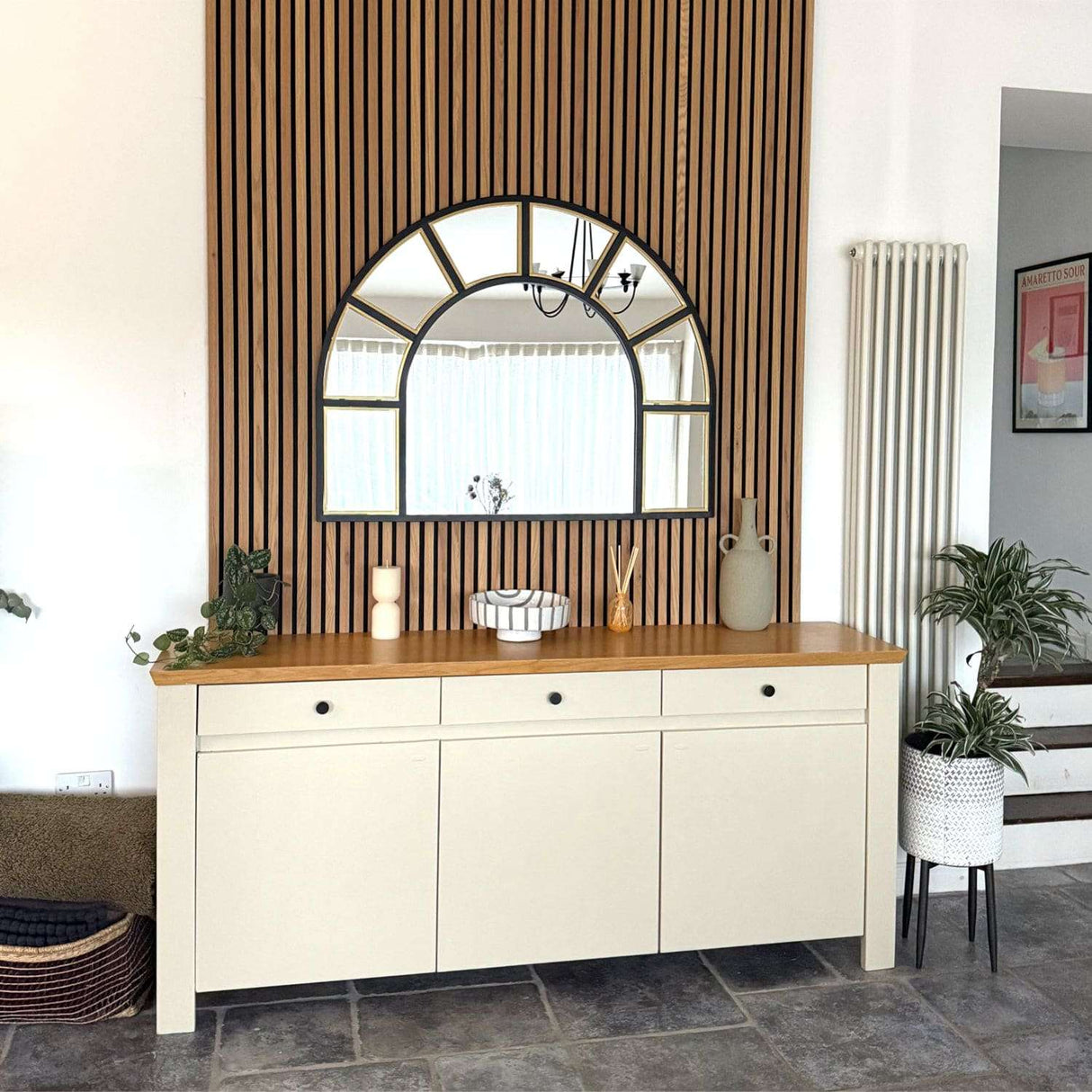Stylish Jobu Home Window Mirror above a wooden console table with decorative items