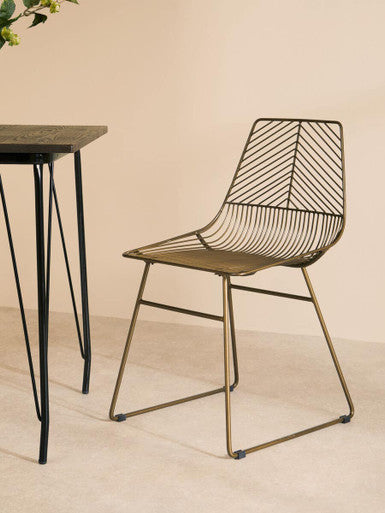 Orsina Wire Chair with a modern design, featuring a sleek metal frame and stylish geometric pattern