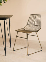 Orsina Wire Chair with a modern design, featuring a sleek metal frame and stylish geometric pattern