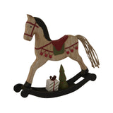 Decorative wooden rocking horse Christmas room decoration with gifts and a tree for festive charm