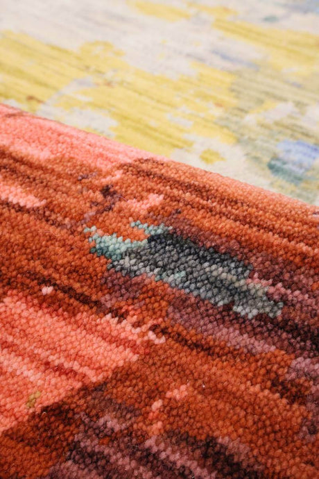 Close-up of a vibrant Wool Blend Rug featuring textured patterns and rich colours for stylish interiors
