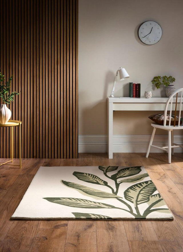 Stylish wool rug with green leaf design, perfect for enhancing living spaces and home decor