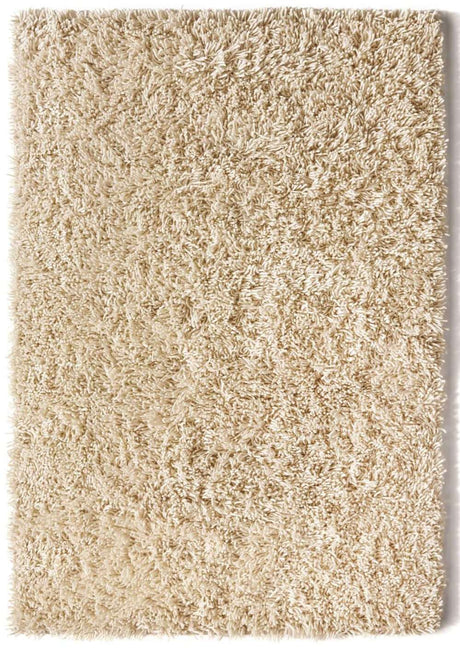 Soft cream Wool Rug with a plush shag texture, perfect for adding warmth to any room