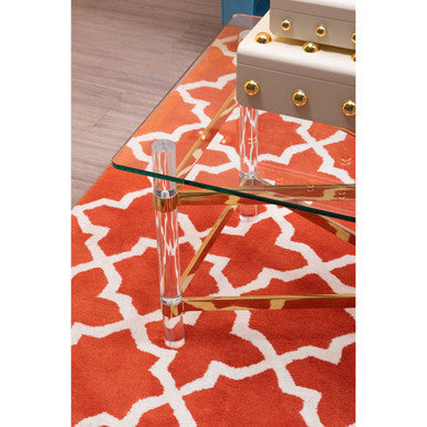 Orsina Woven Rug in vibrant orange with geometric pattern, perfect for living room decor