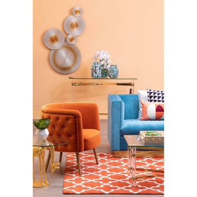 Orsina Woven Rug in vibrant orange and geometric pattern, enhancing modern living room decor