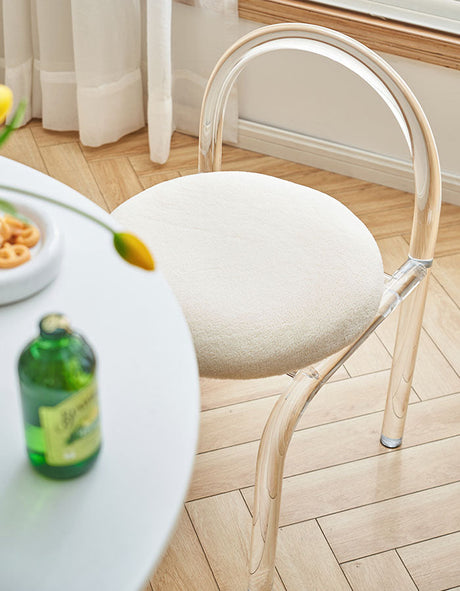Stylish Le Di Vita Dressing Table Chair with a clear frame and soft upholstered seat